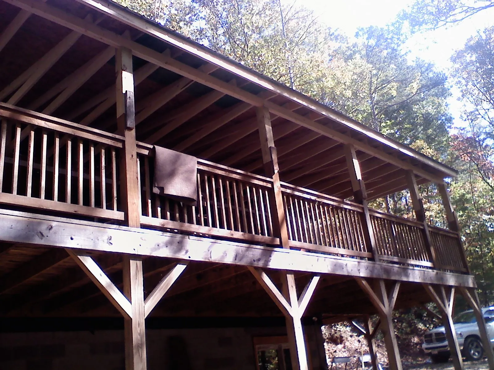 Timber framing under a new elevated porch and deck — Roof Leak Repair in Pine Brook by Roofing Brothers